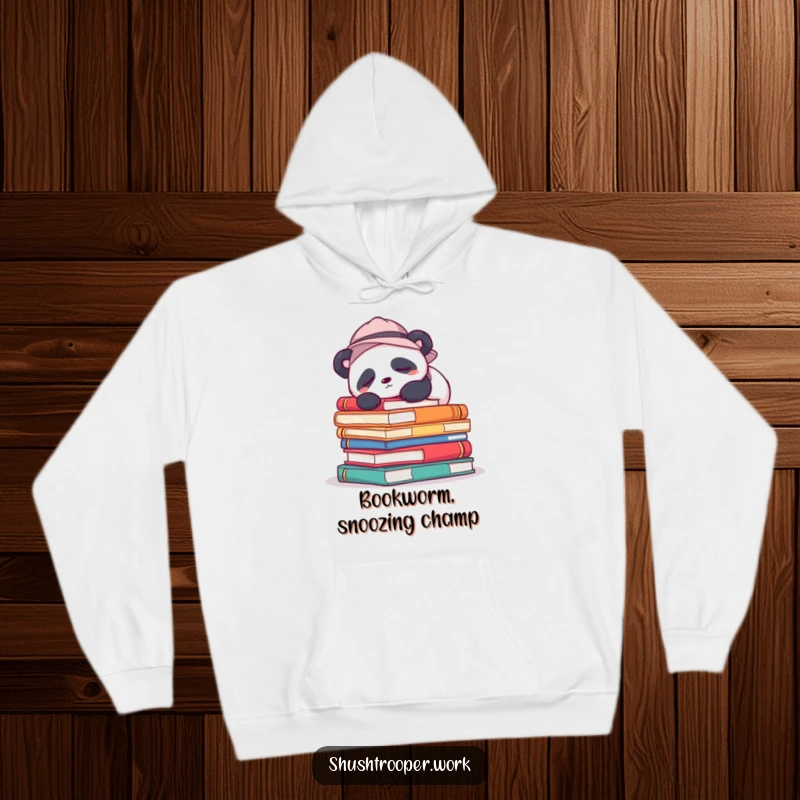 Funny Hoodie with a sleepy panda wearing a hat, napping on a mountain of colorful books, symbolizing relaxation.