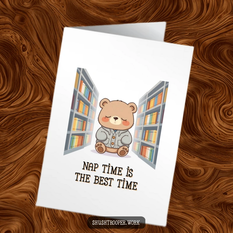 Funny Free Printable Birthday Card: A cute bear in a cardigan naps peacefully among library books. Cozy wishes.